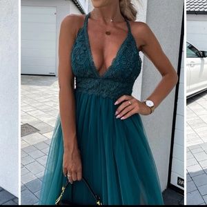 Teal Tulle gown.